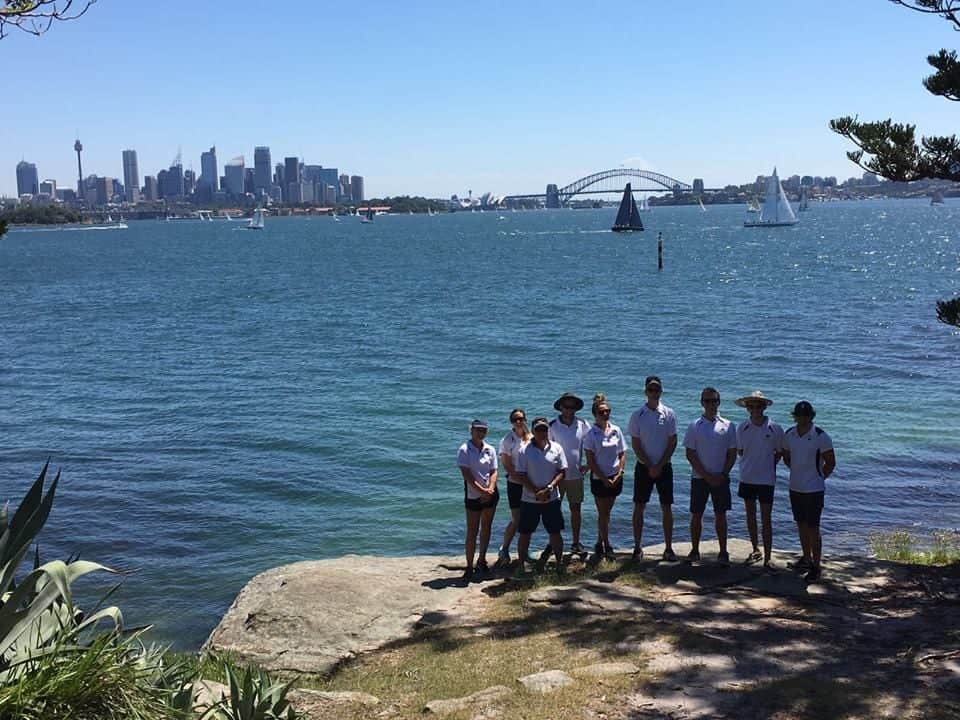 team looking at creating happier workplace