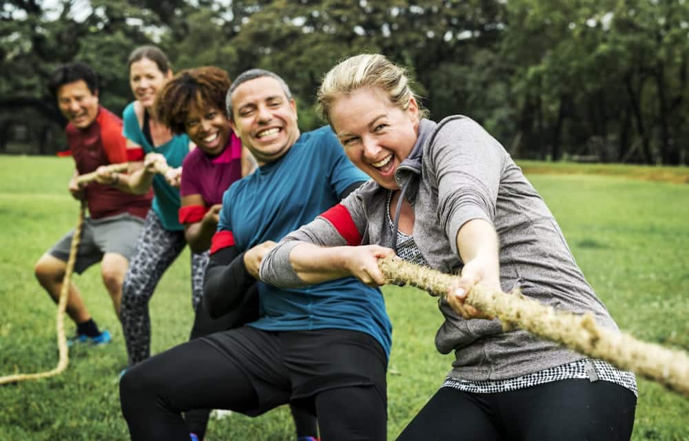 Team pulling rope activity