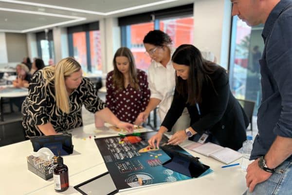 Five team members participating in Before Mars activity