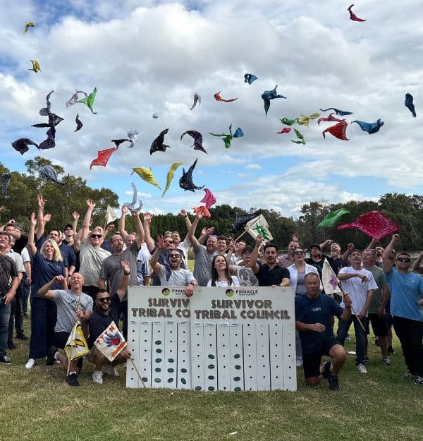 Group cheering after participating in Survivor