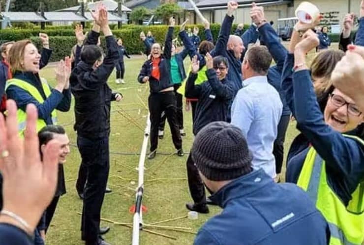 A team cheering after completing the pipeline